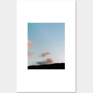 Pastel moody sunset clouds with a small moon Posters and Art